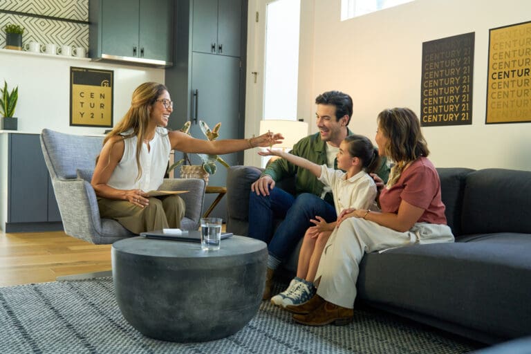 A CENTURY 21 Masters agent meeting with a family